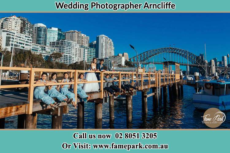 Photo of the Bride and the Groom with the secondary sponsors at the bridge Arncliffe NSW 2205