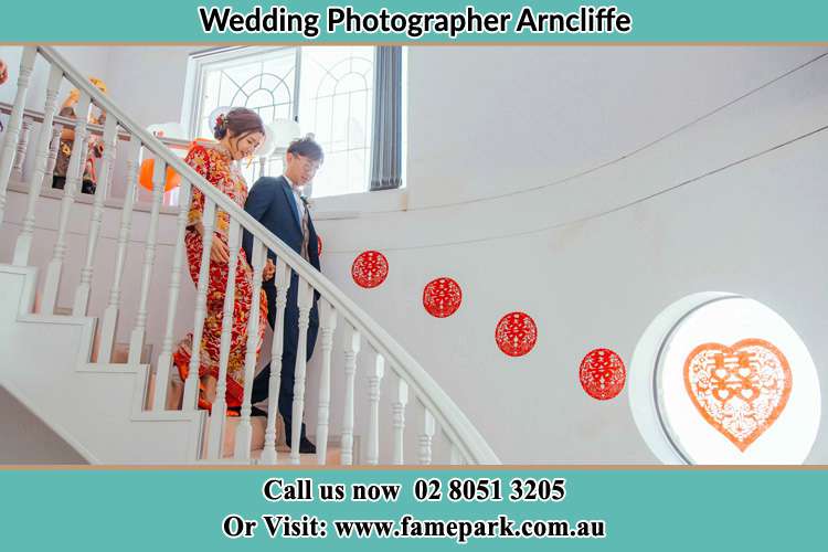 Photo of the Bride and the Groom walking down the stair Arncliffe NSW 2205