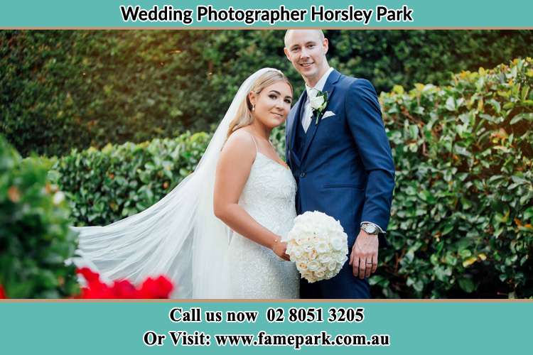 The Bride and the Groom smiling on the camera Horsley Park NSW 2175