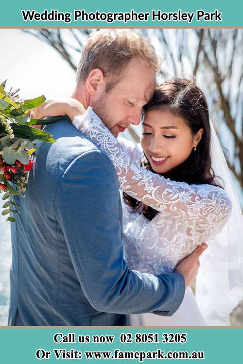 Photo of the Groom and the Bride embrace each other Horsley Park NSW 2175