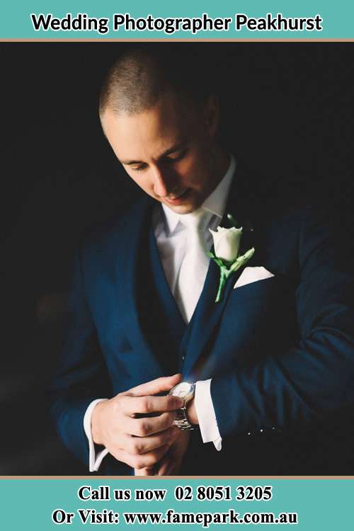 Photo of the groom checking his watch Peakhurst NSW 2210