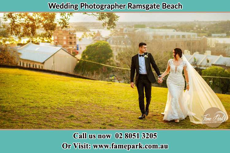 Photo of the Groom and the Bride walking on the yard Ramsgate Beach NSW 2217